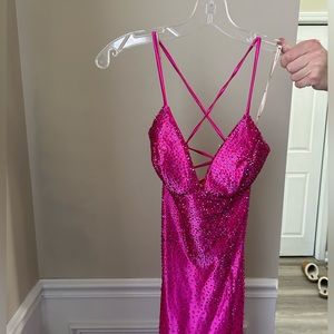 This is an XoBySophias pink jeweled prom dress 🩷